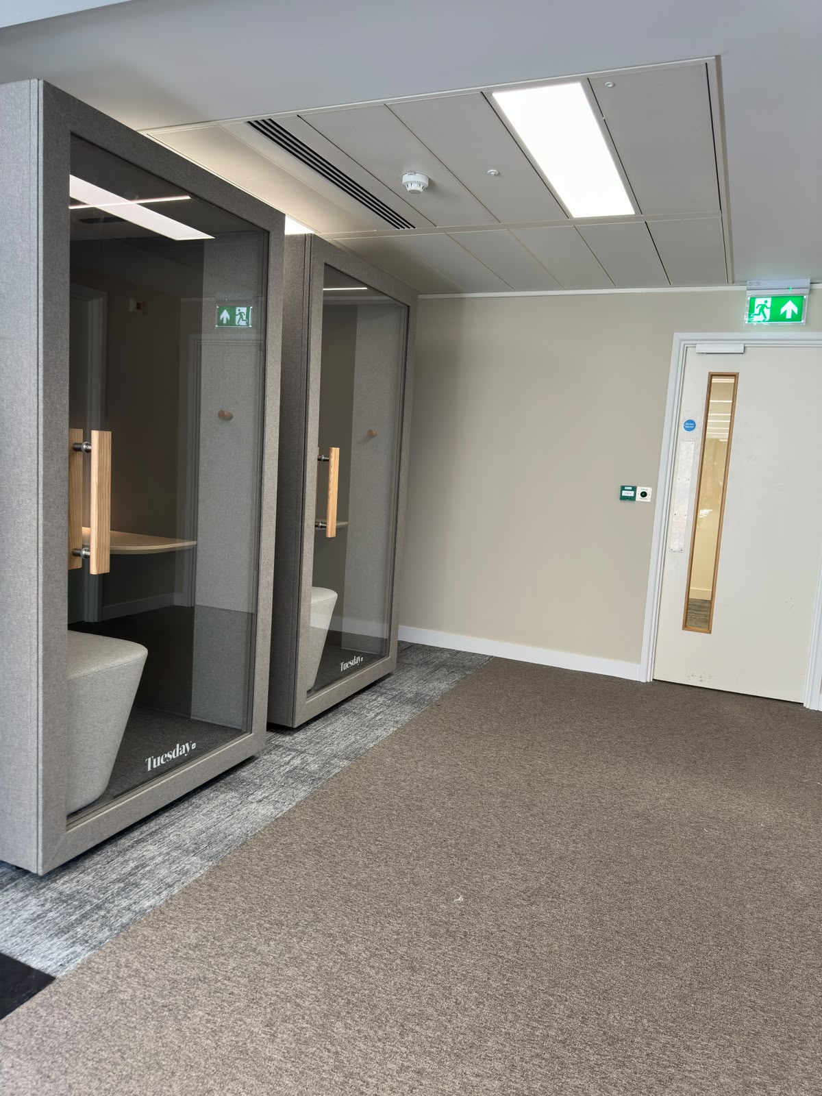 Tuesday acoustic booths installed near a fire exit corridor